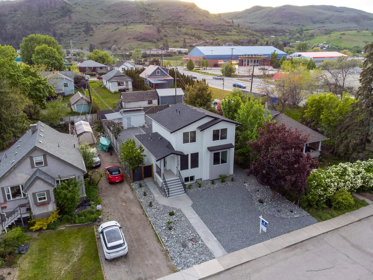 An aerial view of the home in its Vernon neighbourhood
